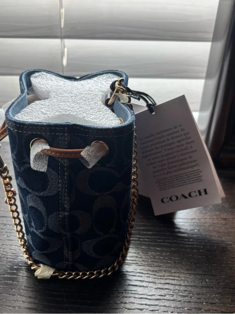 Coach Signature Denim Drawstring Wristlet
Navy Mini Bucket Bag with Gold Chain - Picture 5 of 10